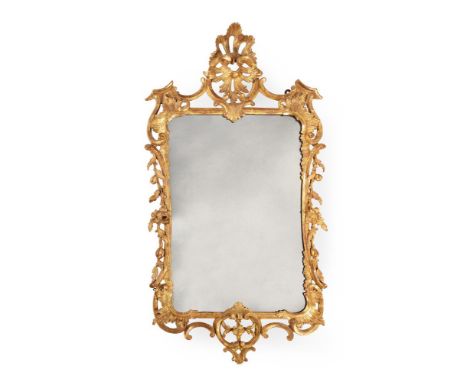 AN EARLY GEORGE III GILTWOOOD WALL MIRROR IN THE MANNER OF THOMAS CHIPPENDALE, CIRCA 1760118cm high, 64cm wideCondition Repor