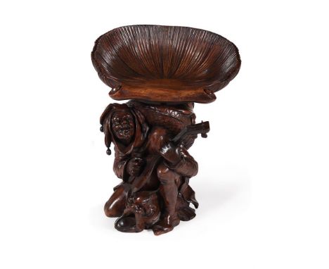 AN ITALIAN CARVED MAHOGANY FIGURAL 'GROTTO' CHAIR IN THE MANNER OF FRANCESCO TOSO, 19TH CENTURY With revolving height adjusta