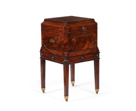 A GEORGE III MAHOGANY CELLARETIN THE MANNER OF THOMAS CHIPPENDALE, CIRCA 1780The hinged top opening to a divided interior71cm