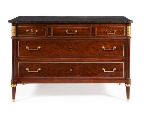 A DIRECTOIRE PLUM PUDDING MAHOGANY AND GILT METAL MOUNTED COMMODE CIRCA 1795With a variegated black marble top 89cm high, 131