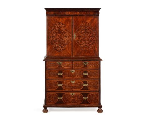 Y A WILLIAM & MARY KINGWOOD, WALNUT AND SEAWEED MARQUETRY CABINET ON CHESTCIRCA 1690The moulded cornice above a cushion mould