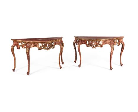 A PAIR OF ITALIAN RED PAINTED AND PARCEL GILT CONSOLE TABLESSECOND HALF 18TH CENTURYeach 87.5cm high, 152cm wide, 66cm deep F