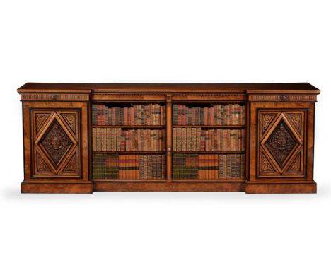 Y A VICTORIAN WALNUT, BURR WALNUT AND EBONISED OPEN BOOKCASEIN THE MANNER OF LAMB OF MANCHESTER, CIRCA 1870 109cm high, 305cm