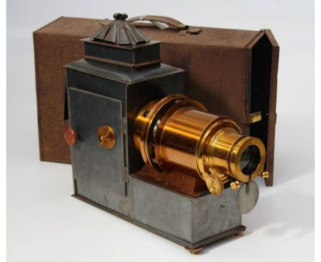 Church Army Lantern Department, London. An early 20th century brass and tin plate housed ' Verlux ' magic lantern, wired for 