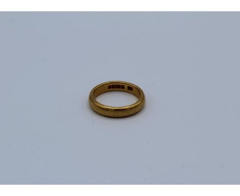 A 22ct gold band ring, size K 1/2. Weight 6.2 grams&nbsp;approximately