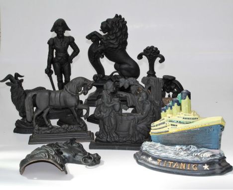 A large quantity of 19th century style painted cast iron door porters including animal figures, Biblical figures, military fi