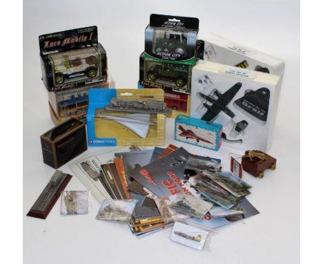 A selection of diecast Corgi toys, boxed together with a number of Locomobile 1 diecast cars and a quantity of brochures, cat