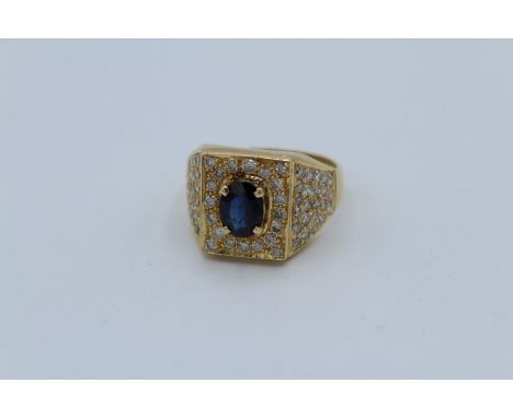 Gentleman's yellow sapphire and diamond ring. Sapphire estimated weight 0.85ct; diamond total weight estimated at 1.00ct. Sta
