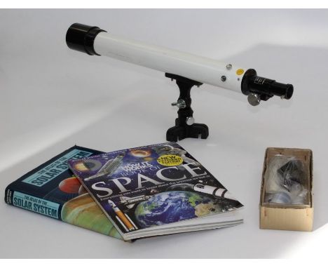 An astronomical telescope Unicorn lens with box of accessories etc, together with folding tripod contained in origial box. In