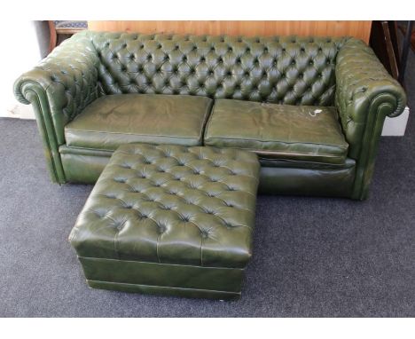 A two seater green leather Chesterfield settee, w 182cm and the matching pouffe, w65cm