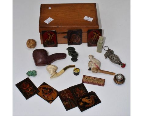 A small Edwardian jewellery box containing various collectors items including a set of eight Indian figural lacquer on card p