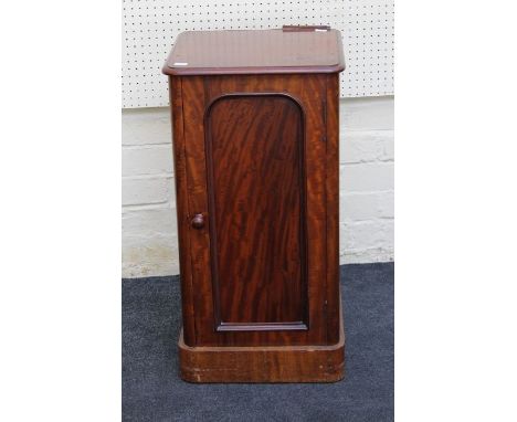 A Victorian mahogany pot cupboard, the arch panel door enclosing single shelf, on plinth, 74 x 38cm