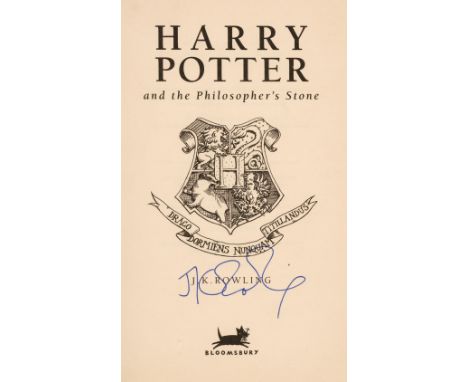 Rowling (J. K.). Harry Potter and the Philosopher's Stone, reprint, London: Bloomsbury, 1997, signed by the author in blue in