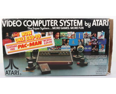 Vintage Atari Video Computer system CX-2600 boxed complete, vintage VCS comes complete with manual instructions and two games