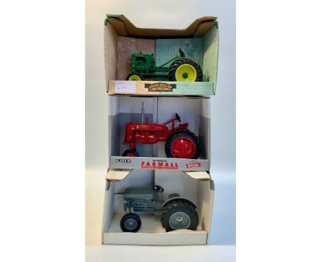 Five Die cast tractor models.Great American Toy Show 1993 Ferguson 30, 1:16 scale, collectors edition.Farmall Super-AV, 1:16 