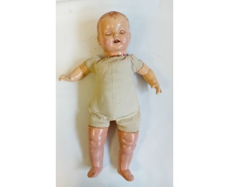 Vintage baby doll maked ''A Petite Doll''