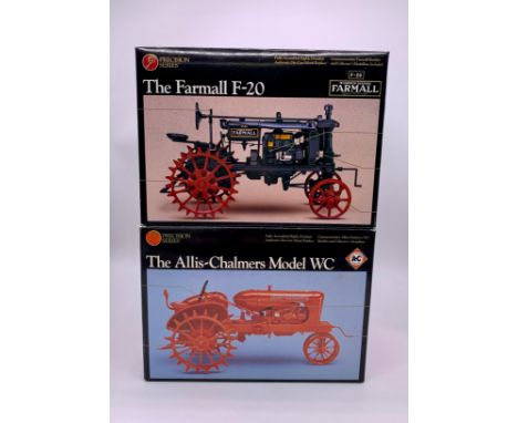 Three die cast tractor models by Precision series,The Allis-Chalmers Model WC, 1:16 scale.The Farmall F-20, 1:16 scale.