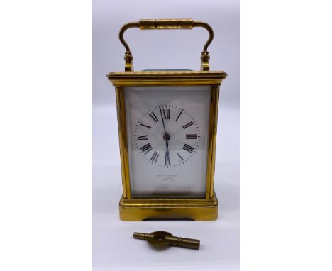 Aird &amp; Thomson Glasgow brass carriage clock in a working condition comes with key.
