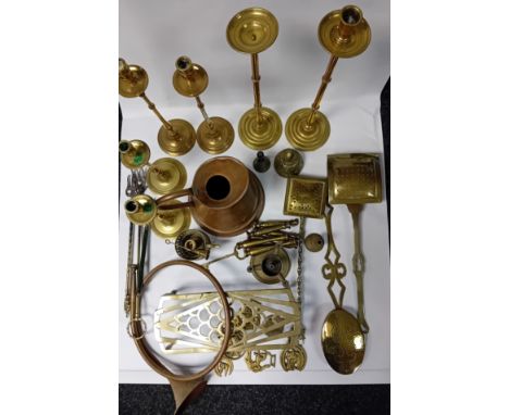 Large collection of brass and copper ware to include candlestick holders, chestnut roasters, hunting horn, fire pokers, dovet