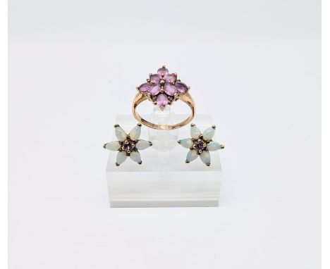 Amethyst set ring, flower head cluster and in shank marked 9K; together with a pair of opal and amethyst earrings flowerhead 