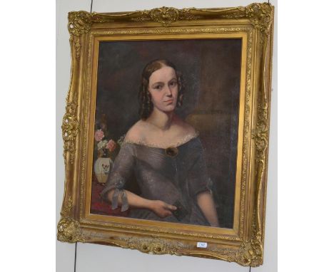 Follower of Margaret Carpenter (1793-1872) Portrait of a young lady, half length, wearing her hair in ringlets, oil on canvas