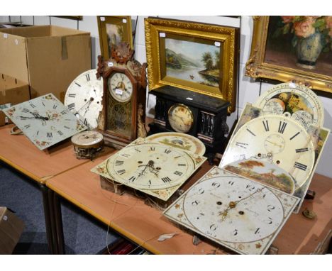 ~ Three eight-day longcase clock movements with painted arch dials; further eight-day longcase clock movements with circular 