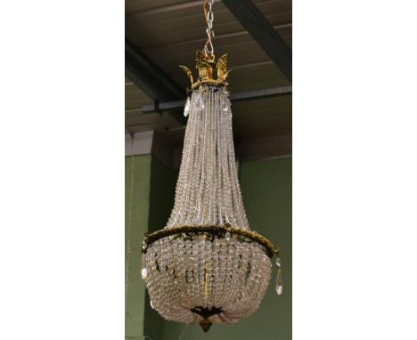 A gilt metal beaded chandelier 