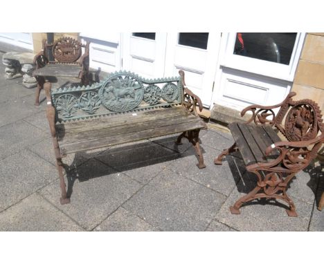 Cast iron garden bench decorated with hounds and game, with slatted wooden seat; together with a pair of matching garden chai