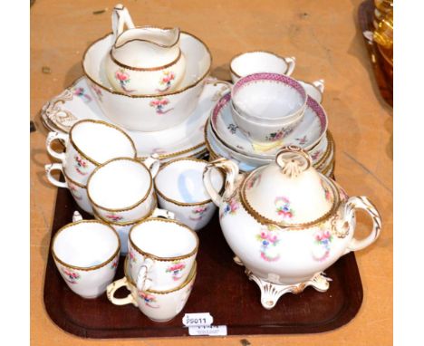 Two Chinese export tea bowls and saucers, circa 1800, together with a part floral painted 19th century tea service
