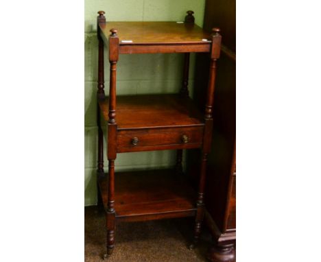 A 19th century mahogany three tier whatnot, the central shelf fitted with a drawer 