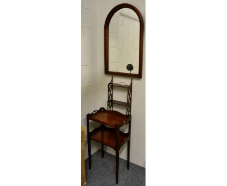 ~ A George III style tray-top two-tier mahogany table; a hanging shelf; and arched mirror 