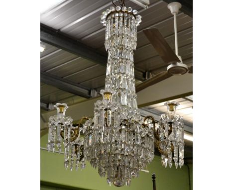 Five branch gilt metal chandelier with glass prism drop lustres 