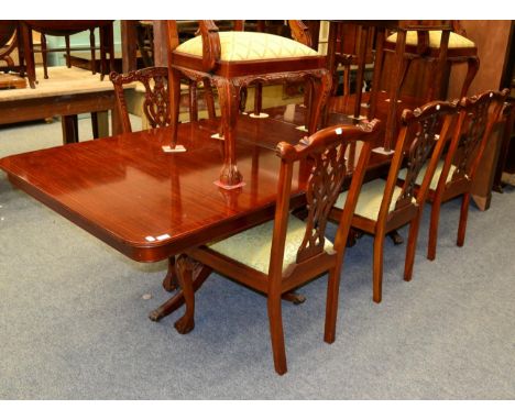 Set of eight reproduction dining chairs including two carvers; together with a reproduction twin-pillar dining table (9) 