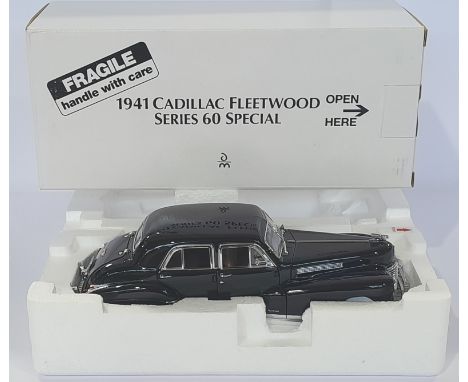 Danbury Mint 1/24th scale a boxed 1941 Cadillac Fleetwood Series Sixty Special - black with brown interior. Conditions genera