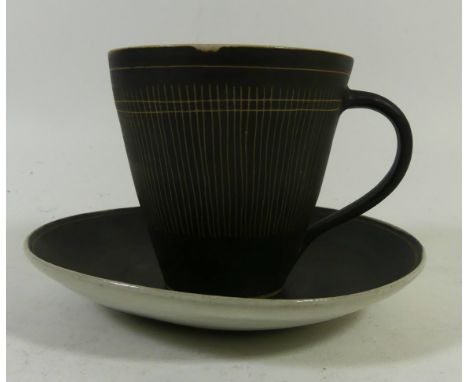 Dame Lucie Rie D.B.E (1902-1995) cup and saucerHaving sgraffito linear decoration, mark to base, height 8cmCONDITION REPORT:G