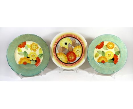Three Art Deco Gray's ceramic platesEach hand painted with floral decorated, factory marks to base, diameter 27cm 