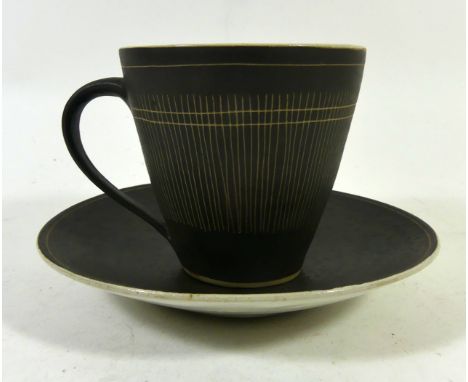 Dame Lucie Rie D.B.E (1902-1995) cup and saucerHaving sgraffito linear decoration, mark to base, height 8cmCONDITION REPORT:G