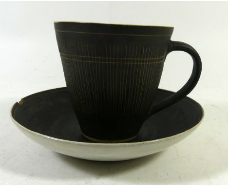 Dame Lucie Rie D.B.E (1902-1995) cup and saucerHaving sgraffito linear decoration, mark to base, height of cup 8cmCONDITION R