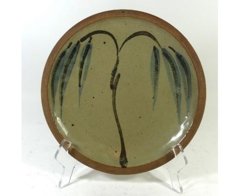 A Leach St Ives Studio Pottery plateDecorated with a Willow Tree, impressed St Ives seal mark, diameter 27cmNB: The design on