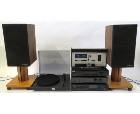 Stereo System Comprises of a 1970s Rega Planar 3 stereo turntable designed by Roy Gandy, a Rega Brio integrated amplifier, a 
