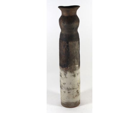 Robin Welch (b.1936-) A large Studio Pottery vase of cylindrical form with flared rim, having incised stylised decoration, im