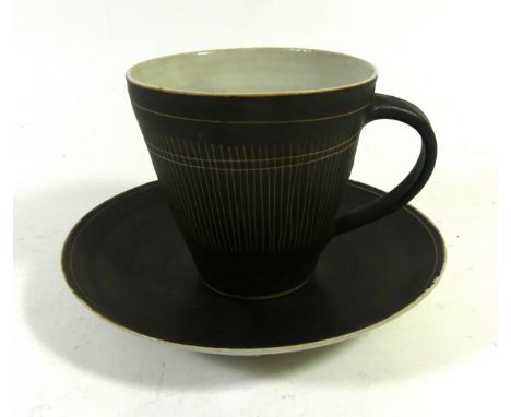 Dame Lucie Rie D.B.E (1902-1995) cup and saucerHaving sgraffito linear decoration, mark to base, height 8cmCONDITION REPORT:C