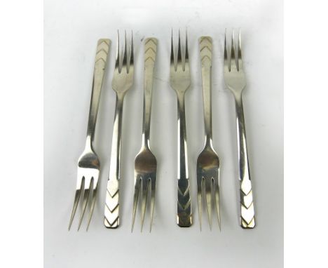 A set of six George V hallmarked silver dessert forksEach with stepped Art Deco handles, by R E Stone, London 1934, length 17