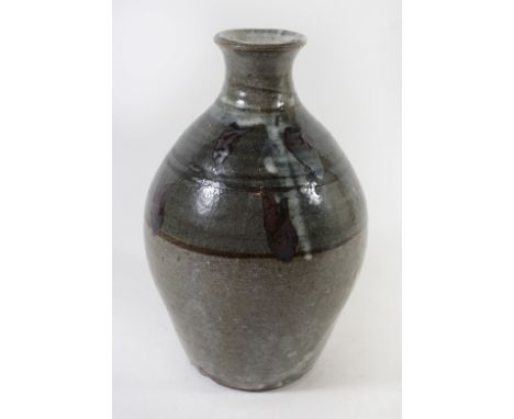 A Trevor Corser Leach St Ives Studio Pottery vaseOf ovoid form, having dripped tenmoku glaze on a celadon glazed ground, impr