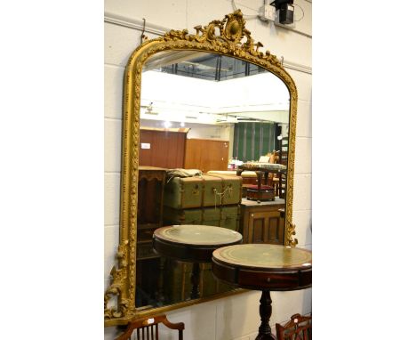 A gilt frame over mantel mirror