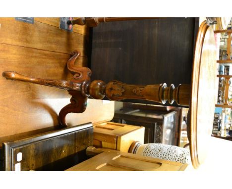 A burr walnut inlaid games table on a tripod base 