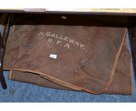 An early 20th century canvas duffel bag belonging to H Galleway R.F.A (The Royal Fleet Auxiliary), together with two vintage 