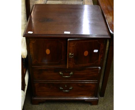 A Georgian mahogany commode cabinet 
