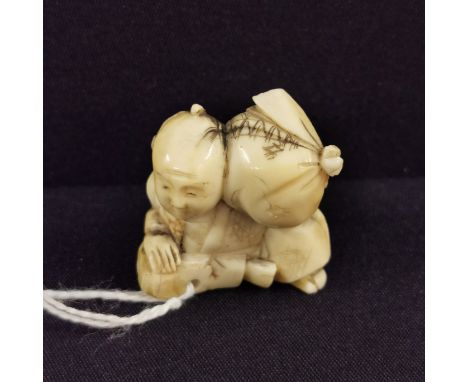 ANTIQUE CARVED IVORY NETSUKE