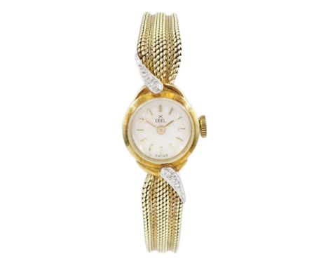 Ebel ladies 14ct gold manual wind diamond wristwatch, silvered dial with baton hour markers, a row of diamonds set each side 